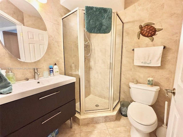 bathroom with vanity, an enclosed shower, tile patterned floors, and toilet