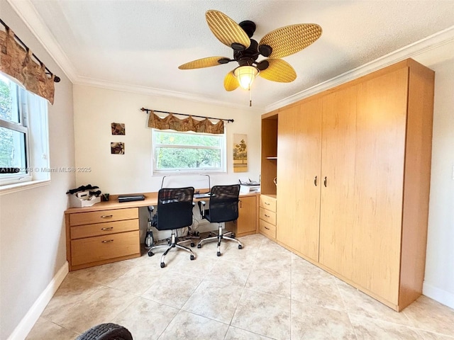 tiled office space with ceiling fan, crown molding, a textured ceiling, and a healthy amount of sunlight