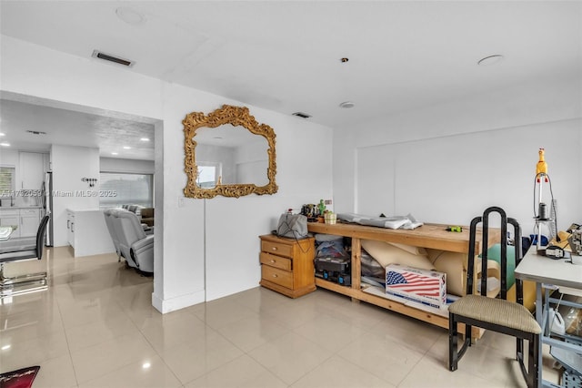 miscellaneous room with tile patterned floors