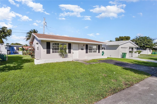 ranch-style home with a front yard