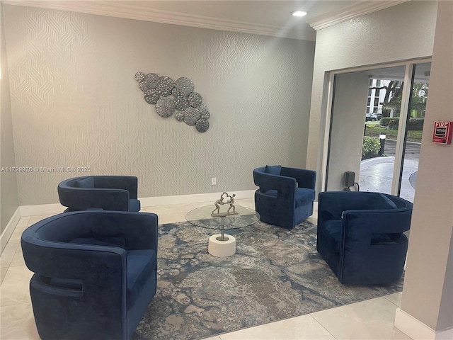 living area featuring tile patterned flooring and ornamental molding