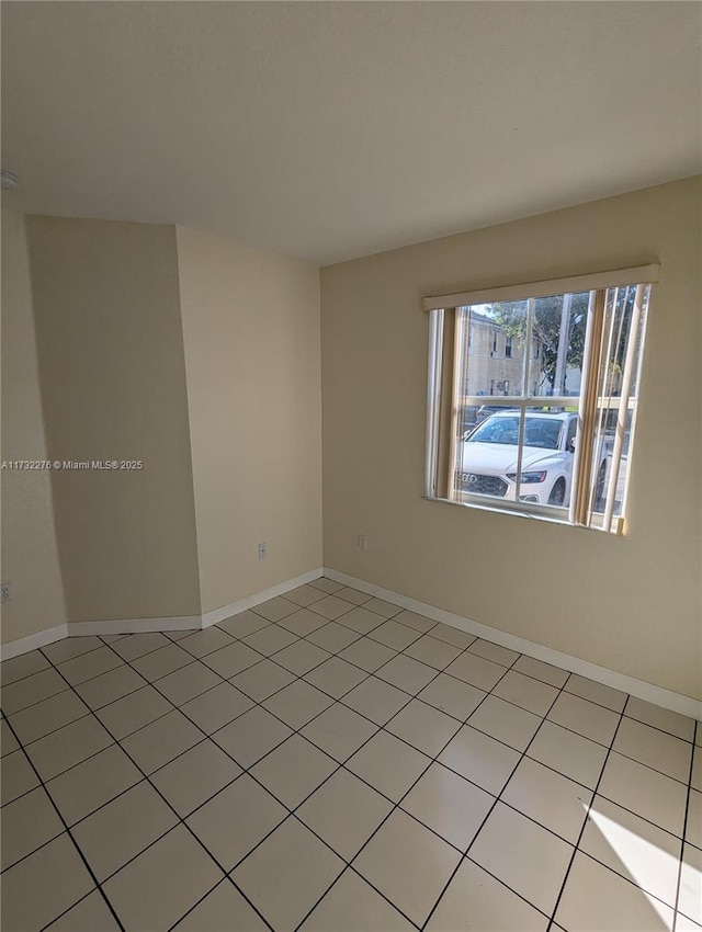 view of tiled empty room