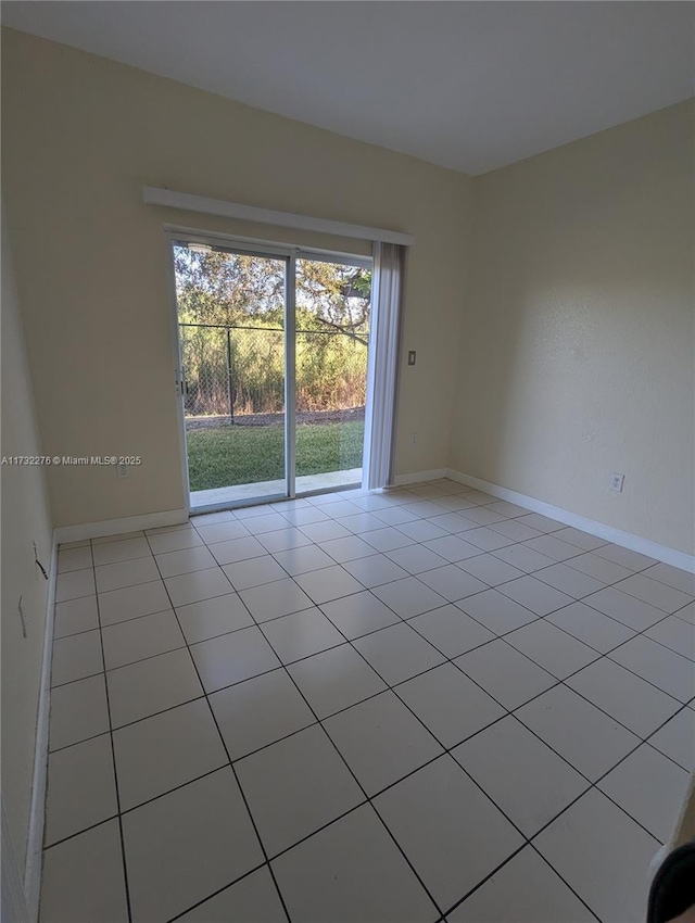 view of tiled spare room