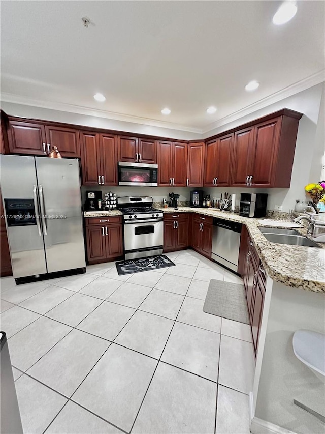 kitchen with light tile patterned flooring, sink, ornamental molding, stainless steel appliances, and light stone countertops