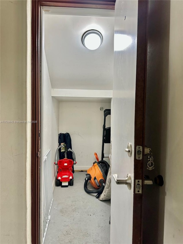 hallway featuring concrete floors