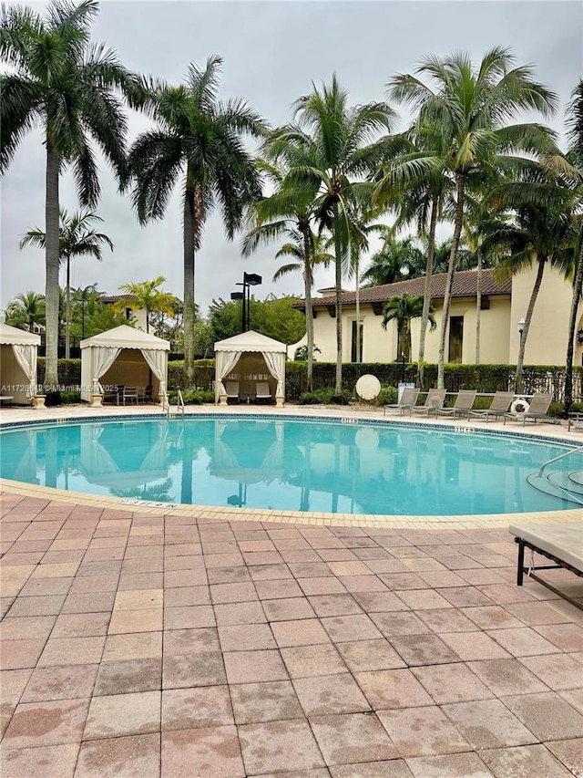 view of swimming pool featuring a gazebo