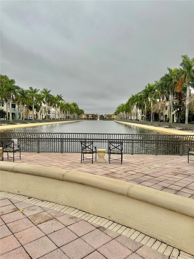 view of patio featuring a water view