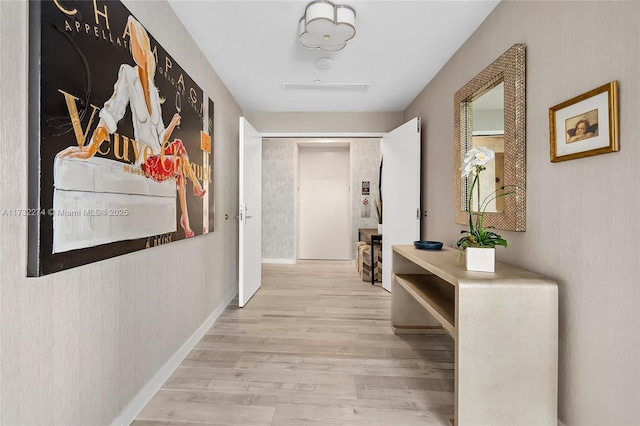 hallway featuring light hardwood / wood-style flooring