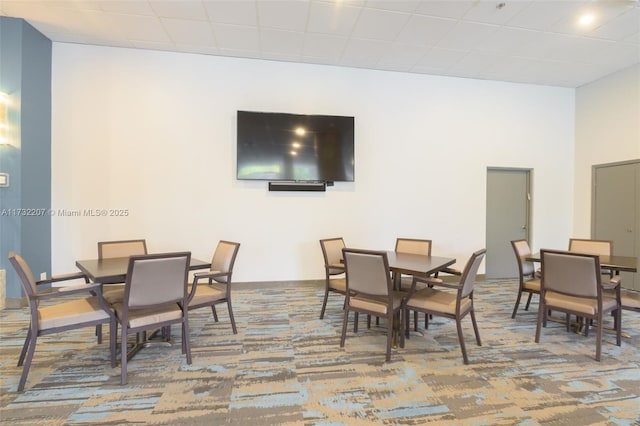 view of carpeted dining area