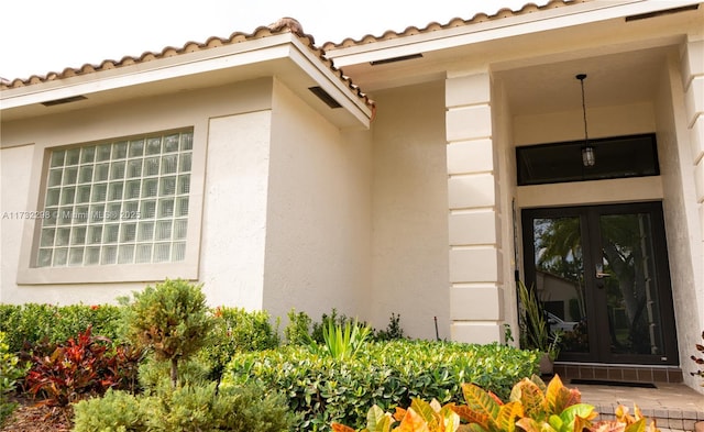 doorway to property featuring french doors