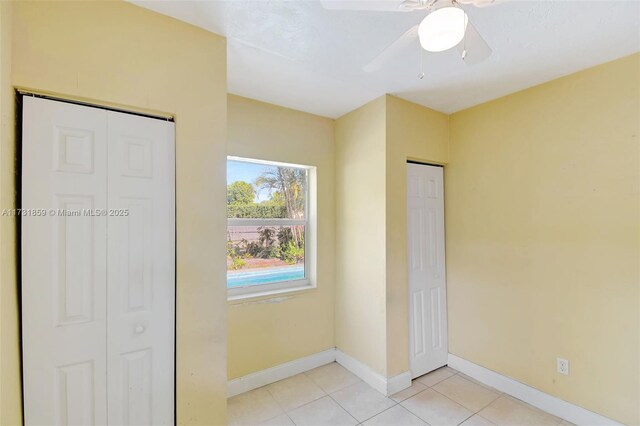 empty room featuring light tile patterned flooring