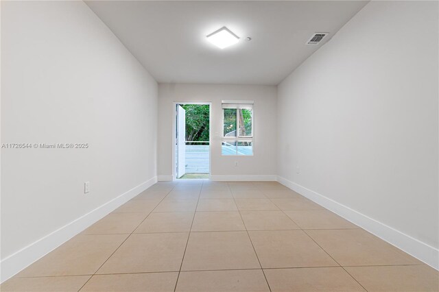 2555 NE 193rd St Unit 2102, Miami, FL 33180 - spare room featuring light tile patterned flooring