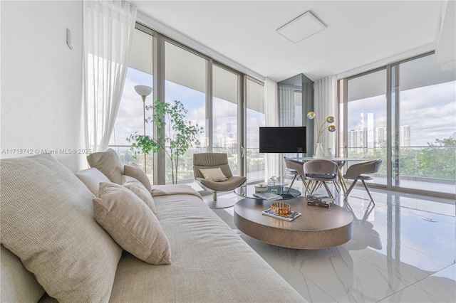 living room with floor to ceiling windows