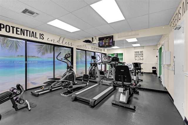 gym with a drop ceiling