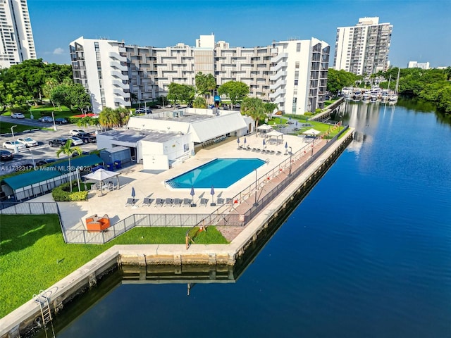 view of pool featuring a water view