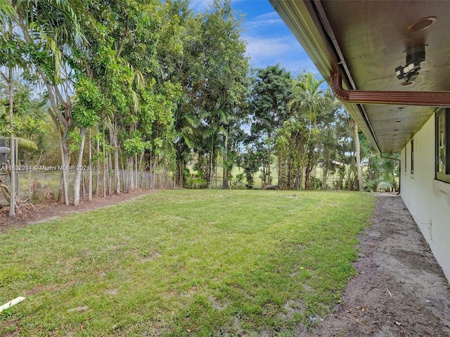 view of yard with fence