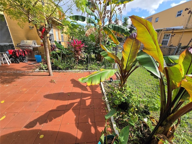 view of patio with a grill