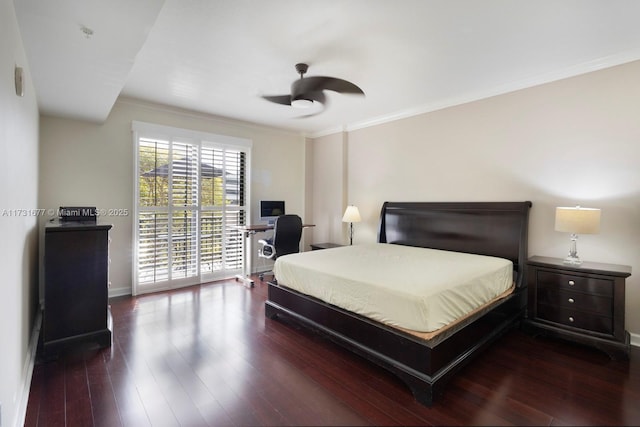 bedroom featuring crown molding, dark wood-type flooring, and ceiling fan