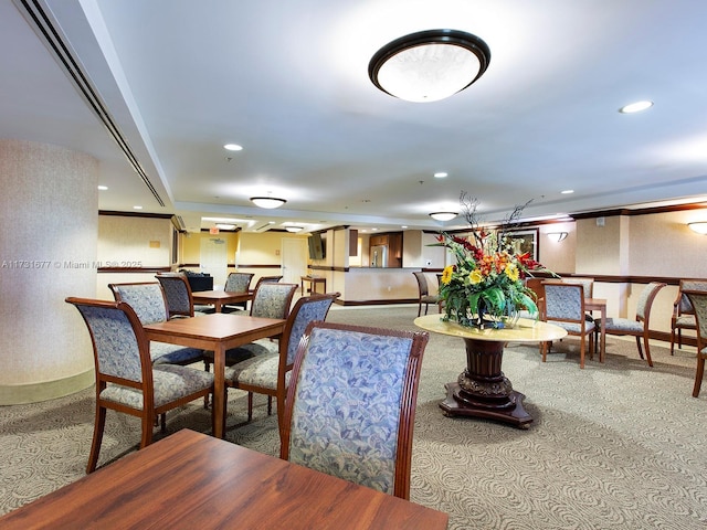 view of carpeted dining area