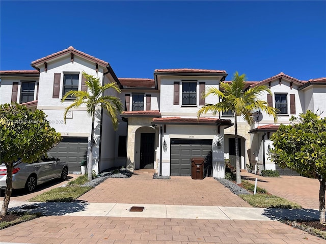 view of front of property with a garage