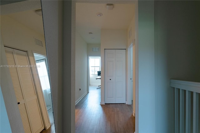 hallway featuring light wood-type flooring