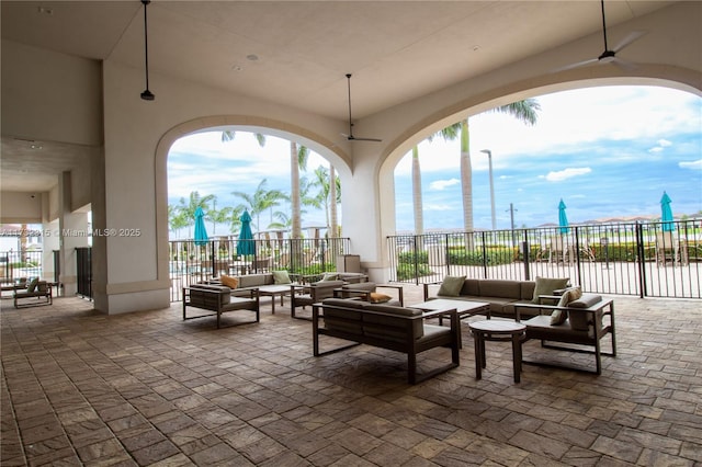 view of patio / terrace featuring outdoor lounge area and ceiling fan