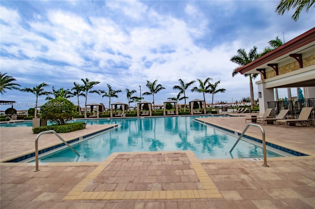 view of swimming pool with a patio area