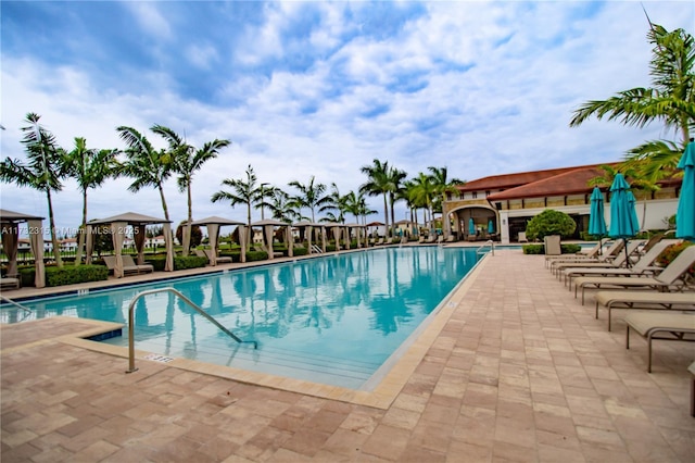 view of swimming pool featuring a gazebo and a patio area