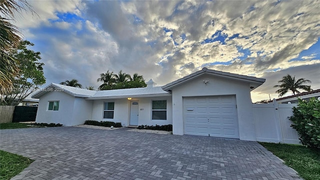 single story home with a garage