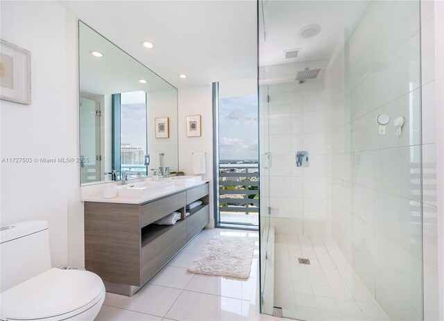 460 NE 28th St Unit 2601, Miami, FL 33137 - full bath featuring tile patterned flooring, vanity, recessed lighting, toilet, and tiled shower