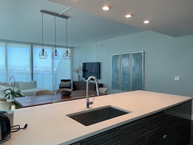 kitchen with sink and decorative light fixtures