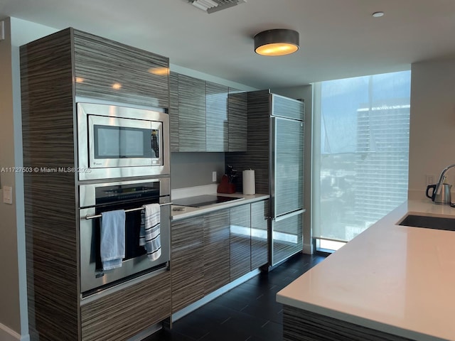 kitchen with appliances with stainless steel finishes and sink