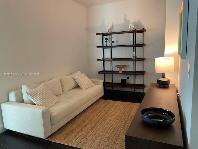 living room with dark hardwood / wood-style floors