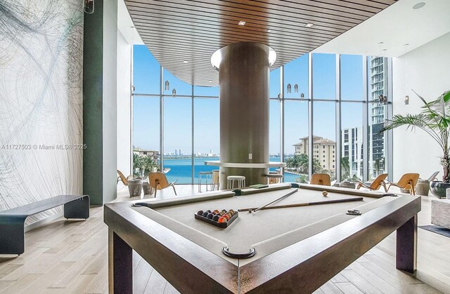 460 NE 28th St Unit 2601, Miami, FL 33137 - playroom featuring a high ceiling, billiards, expansive windows, and wood finished floors