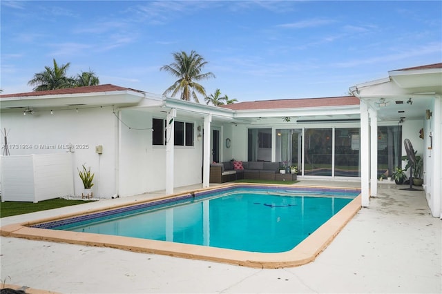 view of swimming pool featuring an outdoor hangout area and a patio