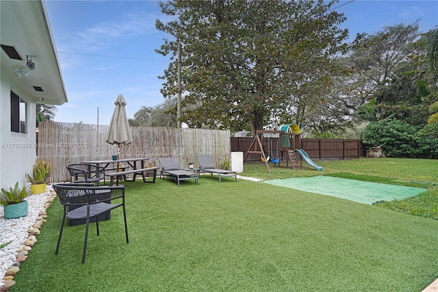 view of yard featuring a playground