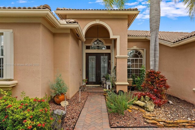 doorway to property featuring french doors