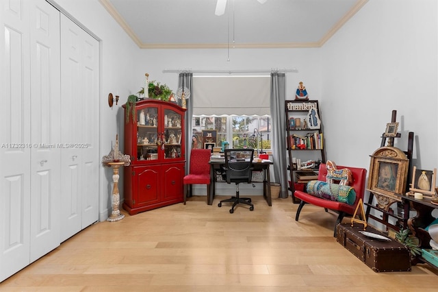 office space with crown molding and light wood-type flooring