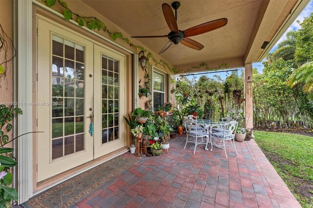 view of patio featuring french doors and ceiling fan