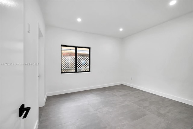 empty room featuring concrete flooring