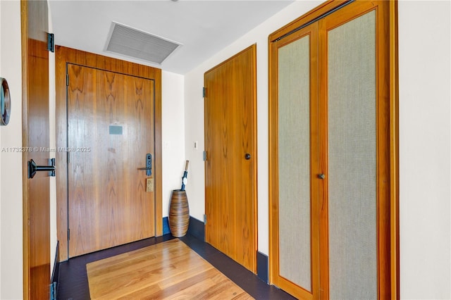 foyer entrance featuring light hardwood / wood-style floors