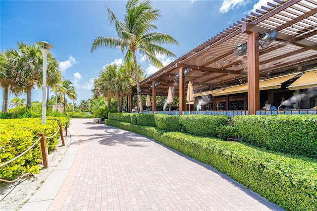 surrounding community featuring a pergola