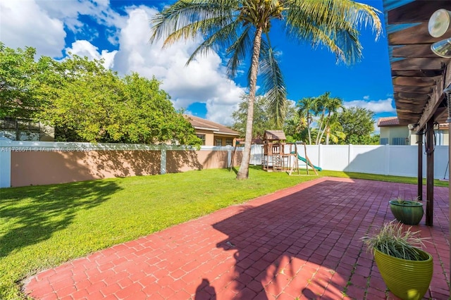 view of patio featuring a playground