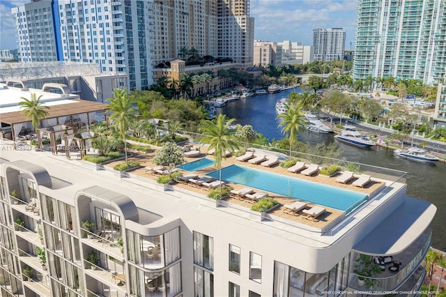 birds eye view of property featuring a water view