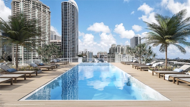 view of swimming pool featuring a deck