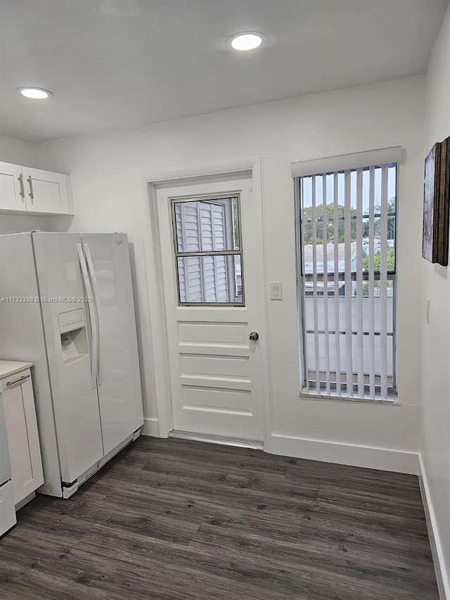 doorway to outside featuring dark hardwood / wood-style floors