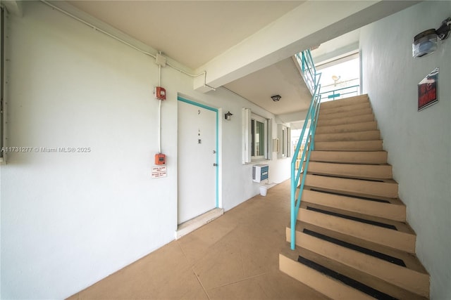 stairway with a wall unit AC