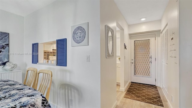 foyer with light wood-type flooring