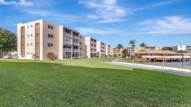 view of community featuring a yard