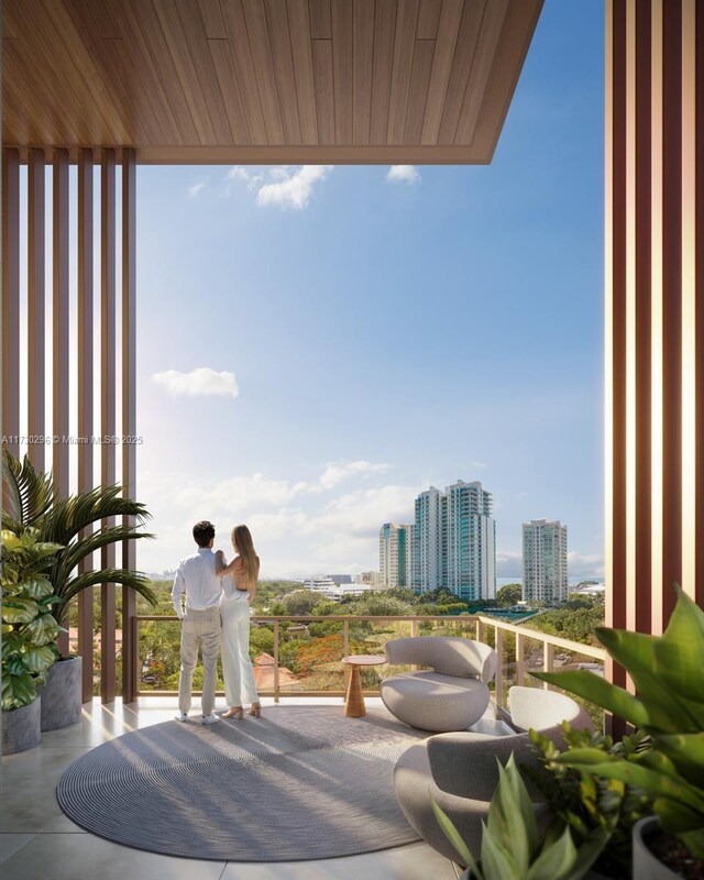 view of patio with a balcony